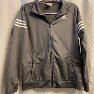 Gray zip up Adidas sweatshirt.